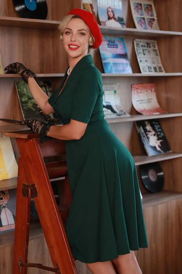 Vestido de 1950 vintage verde escuro com mangas